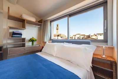 Letto o letti in una camera di Le Stanze degli Amidei