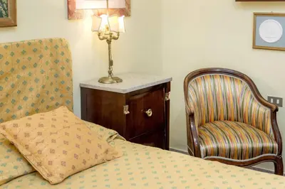 Letto o letti in una camera di Charme in Sant Ambrogio