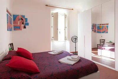 Letto o letti in una camera di Appartamento 123