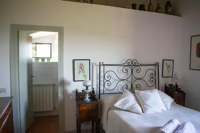 Letto o letti in una camera di Villa Gioietta