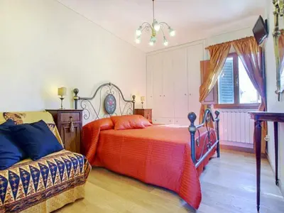 Letto o letti in una camera di Via Dei Pepi Apartment