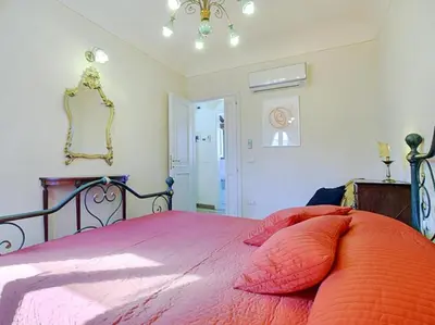 Letto o letti in una camera di Via Dei Pepi Apartment