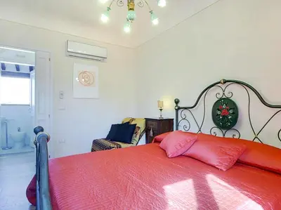 Letto o letti in una camera di Via Dei Pepi Apartment