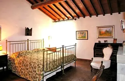 Letto o letti in una camera di Casale Le Torri