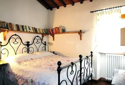 Letto o letti in una camera di Casale Le Torri
