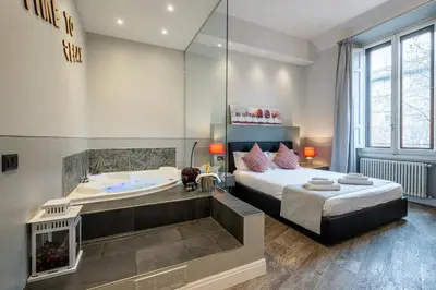 Letto o letti in una camera di Cherubini Palace Thematic Apartment