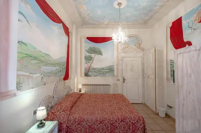 Letto o letti in una camera di Hotel Masaccio