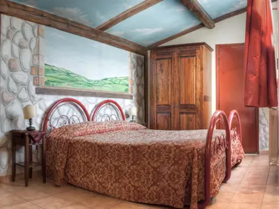 Letto o letti in una camera di Hotel Masaccio