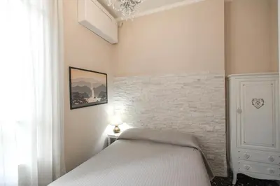 Letto o letti in una camera di Hotel Masaccio