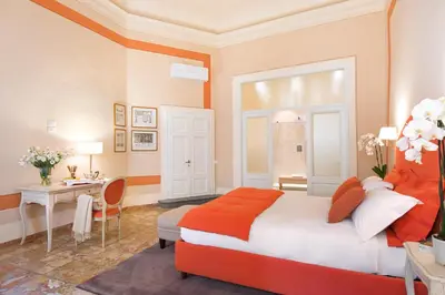 Letto o letti in una camera di B&B Cerretani Palace