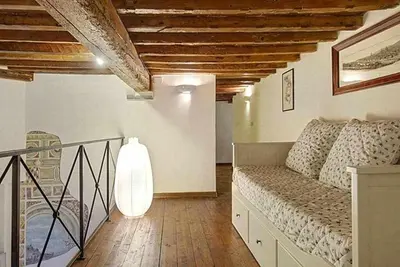 Letto o letti in una camera di Panzani Rustico Vicino Santa Maria Novella