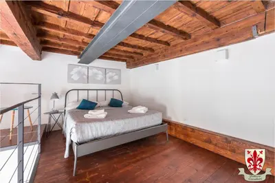 Letto o letti in una camera di Dimora Cavalieri
