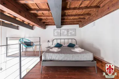 Letto o letti in una camera di Dimora Cavalieri