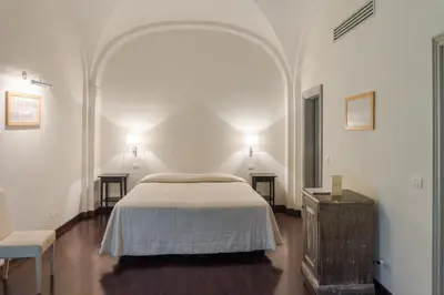 Letto o letti in una camera di Villa Il Palagio