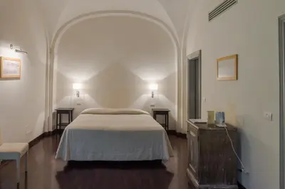 Letto o letti in una camera di Villa Il Palagio