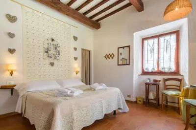 Letto o letti in una camera di Ancora del Chianti