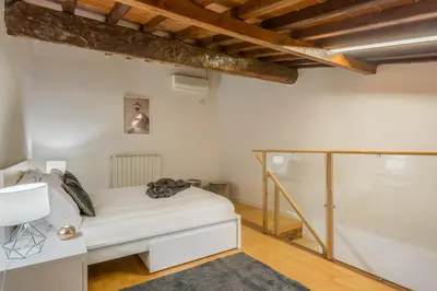 Letto o letti in una camera di Apartments Florence - Fortezza