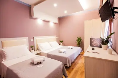Letto o letti in una camera di Hotel Paganini