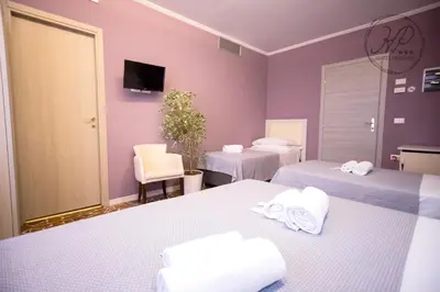 Letto o letti in una camera di Hotel Paganini