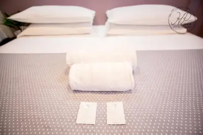 Letto o letti in una camera di Hotel Paganini