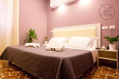 Letto o letti in una camera di Hotel Paganini