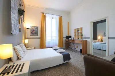 Letto o letti in una camera di B&B In Centro