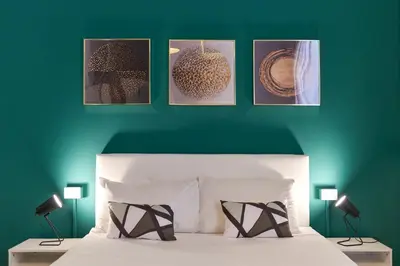 Letto o letti in una camera di B&B In Centro