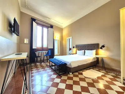 Letto o letti in una camera di Guest House La Grancontessa
