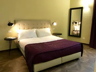 Letto o letti in una camera di Guest House La Grancontessa