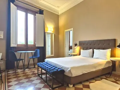 Letto o letti in una camera di Guest House La Grancontessa