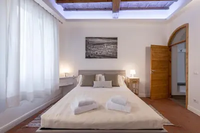 Letto o letti in una camera di Santa Croce Place by Mmega