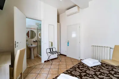 Letto o letti in una camera di B&B La Cittadella