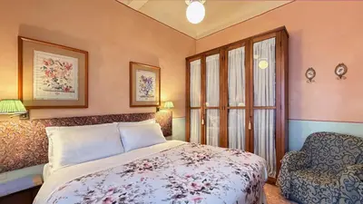 Letto o letti in una camera di Poggio Imperiale Apartments