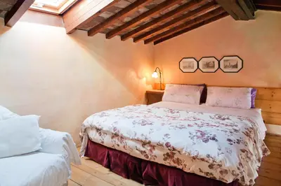 Letto o letti in una camera di Poggio Imperiale Apartments