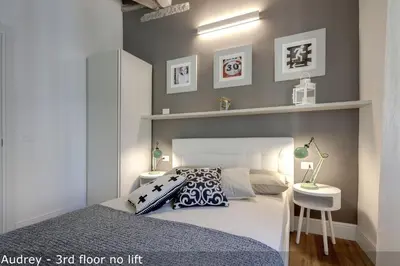 Letto o letti in una camera di Belle Donne Apartments by Mamo Florence