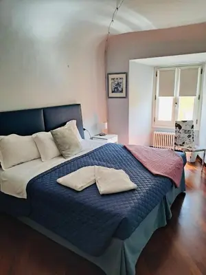 Letto o letti in una camera di Le Dimore di Casa Mattei n°9