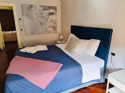 Letto o letti in una camera di Le Dimore di Casa Mattei n°9