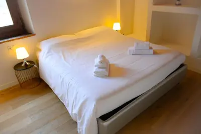Letto o letti in una camera di Rocca Palazzaccio