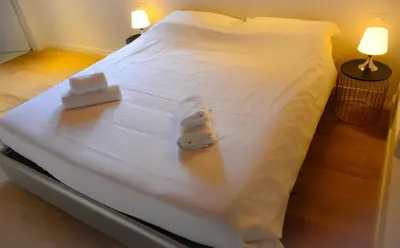 Letto o letti in una camera di Rocca Palazzaccio