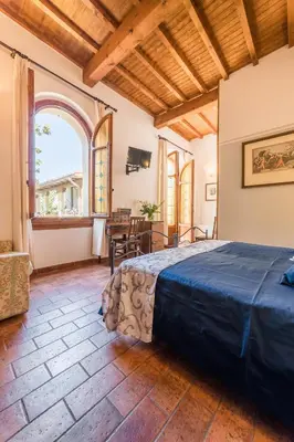 Letto o letti in una camera di Residenza Il Villino B&B