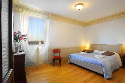 Letto o letti in una camera di Finestra sul Duomo