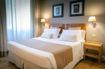 Letto o letti in una camera di Villino Fiorentino