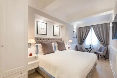 Letto o letti in una camera di Booking Florence