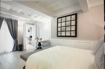 Letto o letti in una camera di Booking Florence