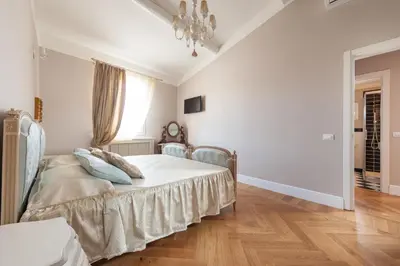 Letto o letti in una camera di Santaelisabettafirenze1