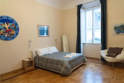Letto o letti in una camera di Relais Accademia