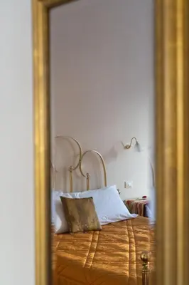 Letto o letti in una camera di Relais Accademia