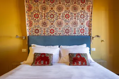 Letto o letti in una camera di Borgo Tegolaio Terrace