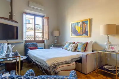 Letto o letti in una camera di Borgo Tegolaio Terrace