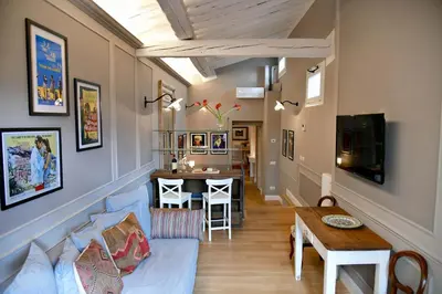 TV o dispositivi per l'intrattenimento presso La Croce d'Oro Santa Croce Suite Apartments